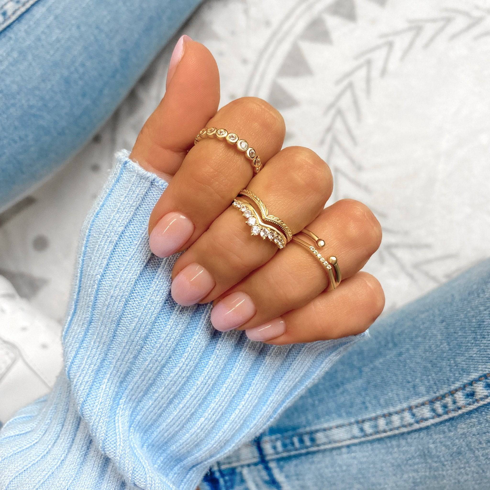 ANILLO VALENTINO COSTA ABIERTO EN V CON CIRCONITAS